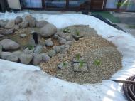 realizace zahrady s jezírkem a stupňovitou skalkou - stavba